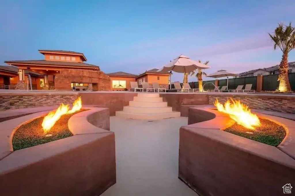 Exterior space with an outdoor fire pit