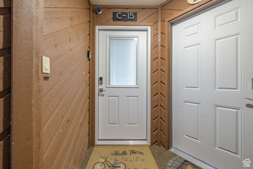 Entryway with wood walls