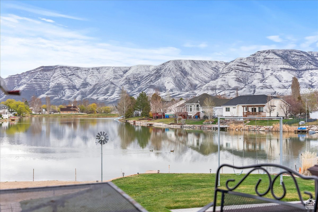 Property view of water with a mountain view