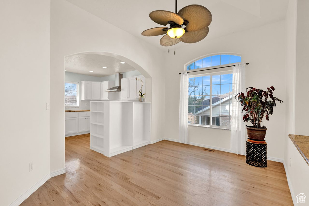 Unfurnished room featuring light hardwood / wood-style floors and ceiling fan