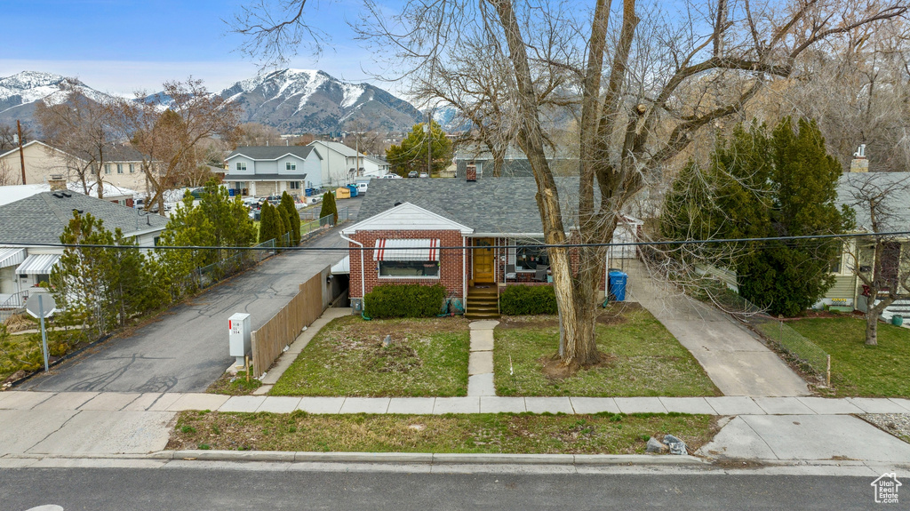 View of front of house with a mountain view