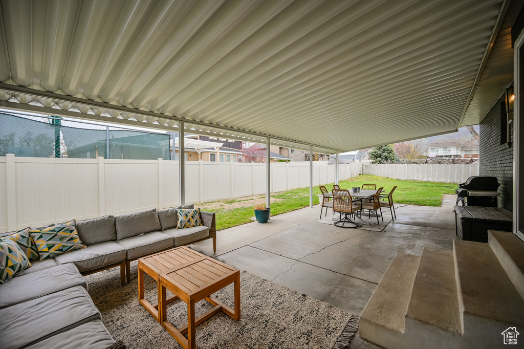 View of terrace featuring grilling area and an outdoor living space