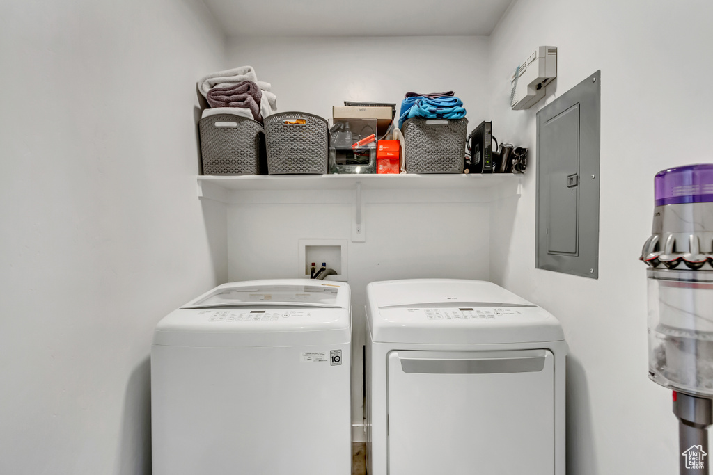 Clothes washing area with washer hookup and washer and clothes dryer