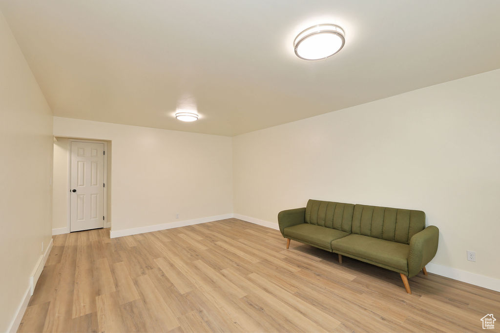 Living area with light hardwood / wood-style floors