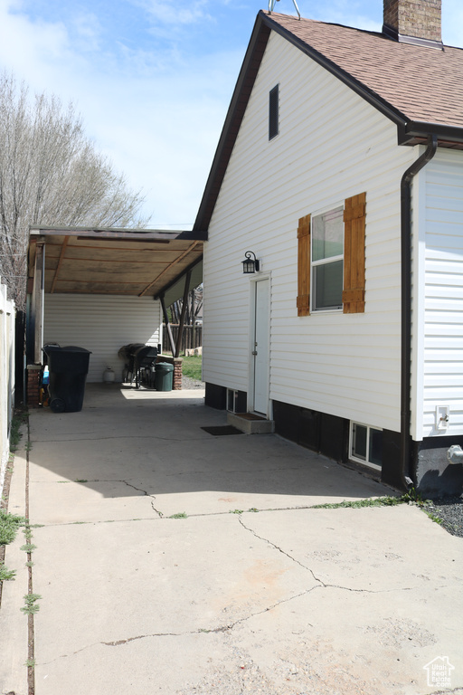 View of home\\\'s exterior featuring a carport