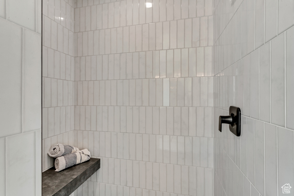 Bathroom featuring tiled shower