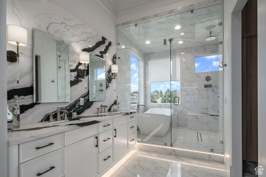 Bathroom with walk in shower, backsplash, dual sinks, tile flooring, and large vanity