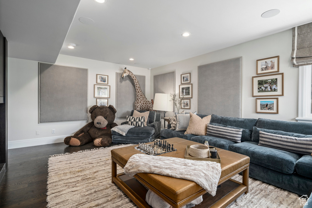 Living room featuring dark hardwood / wood-style flooring