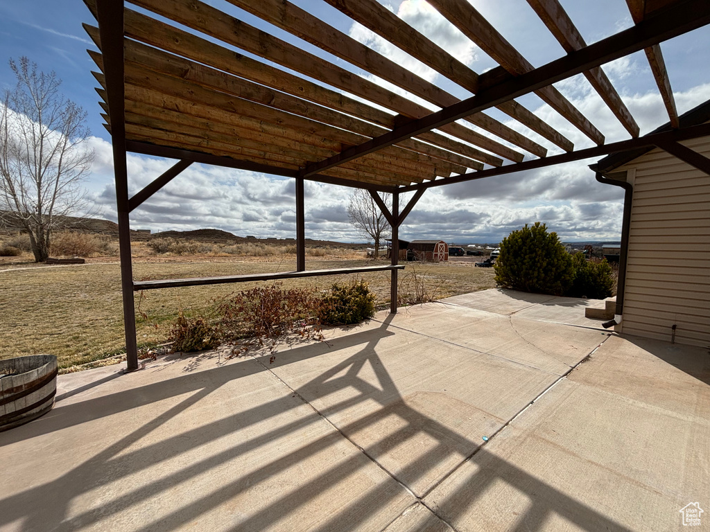 View of patio featuring a pergola