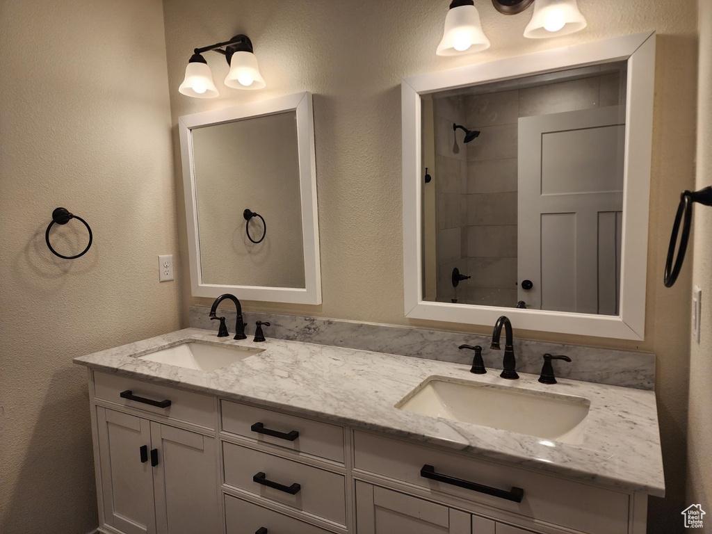 Bathroom featuring double vanity
