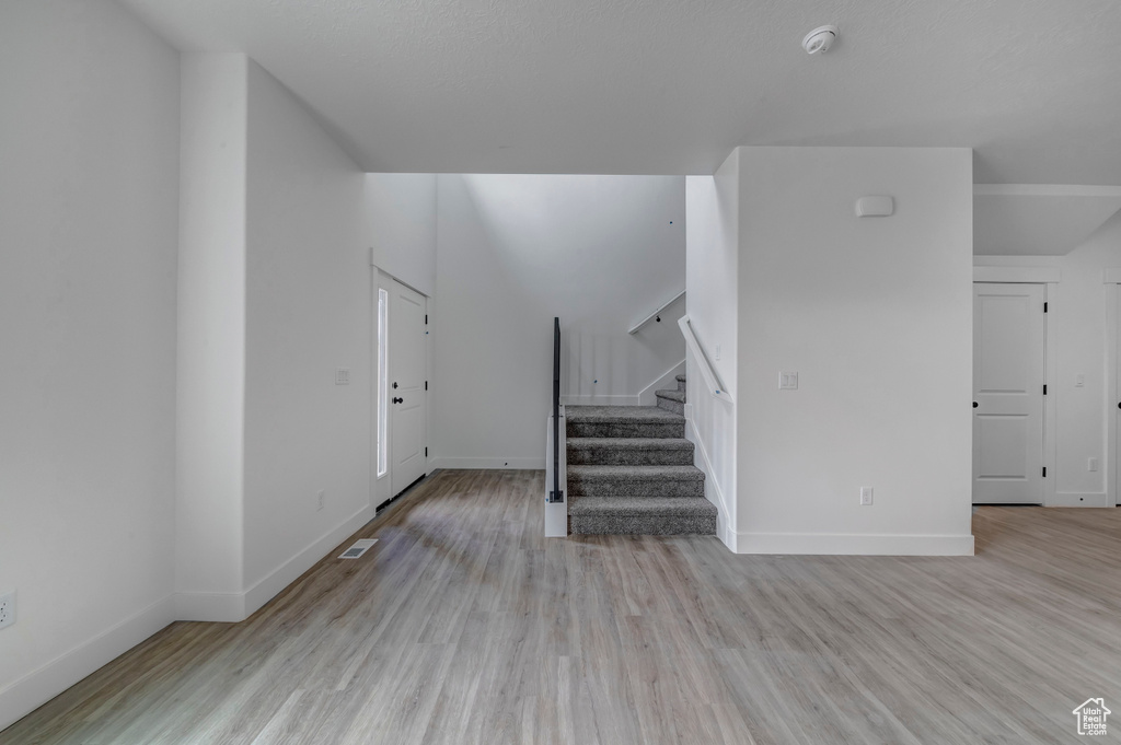 Interior space with light hardwood / wood-style flooring