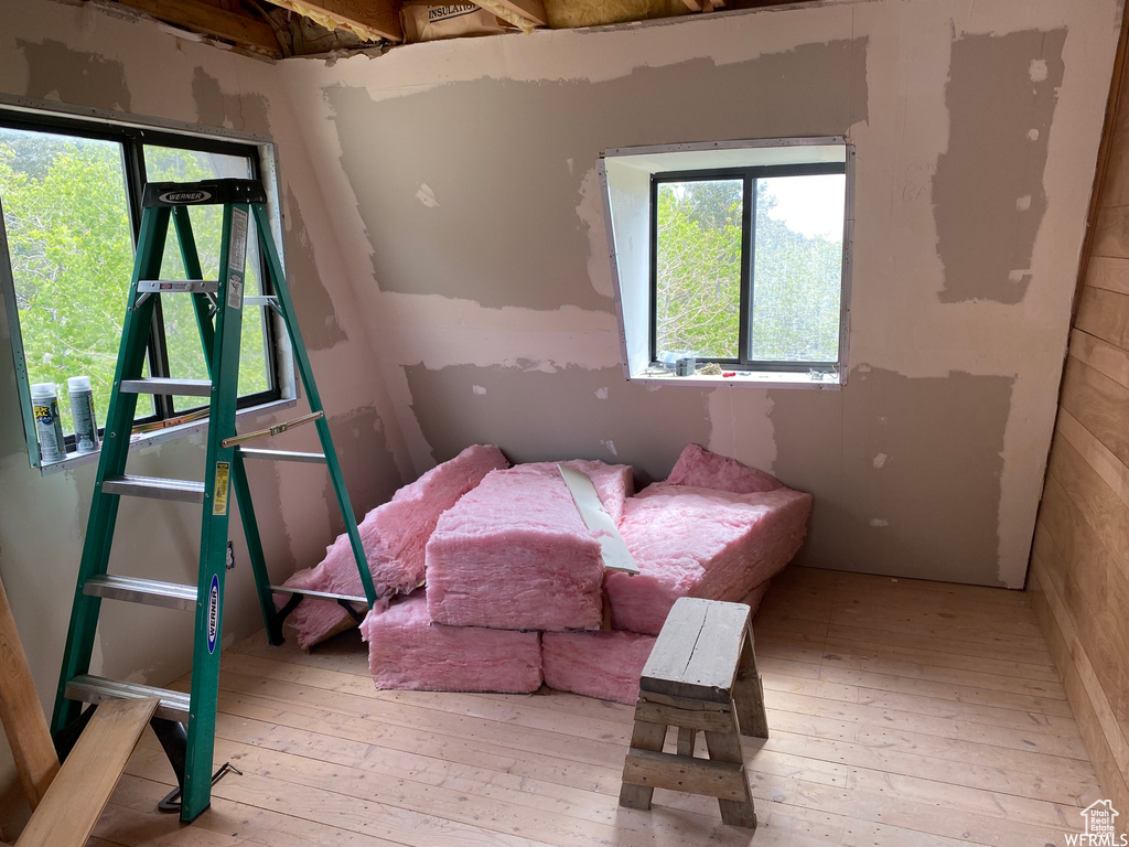 Bedroom with light hardwood / wood-style floors