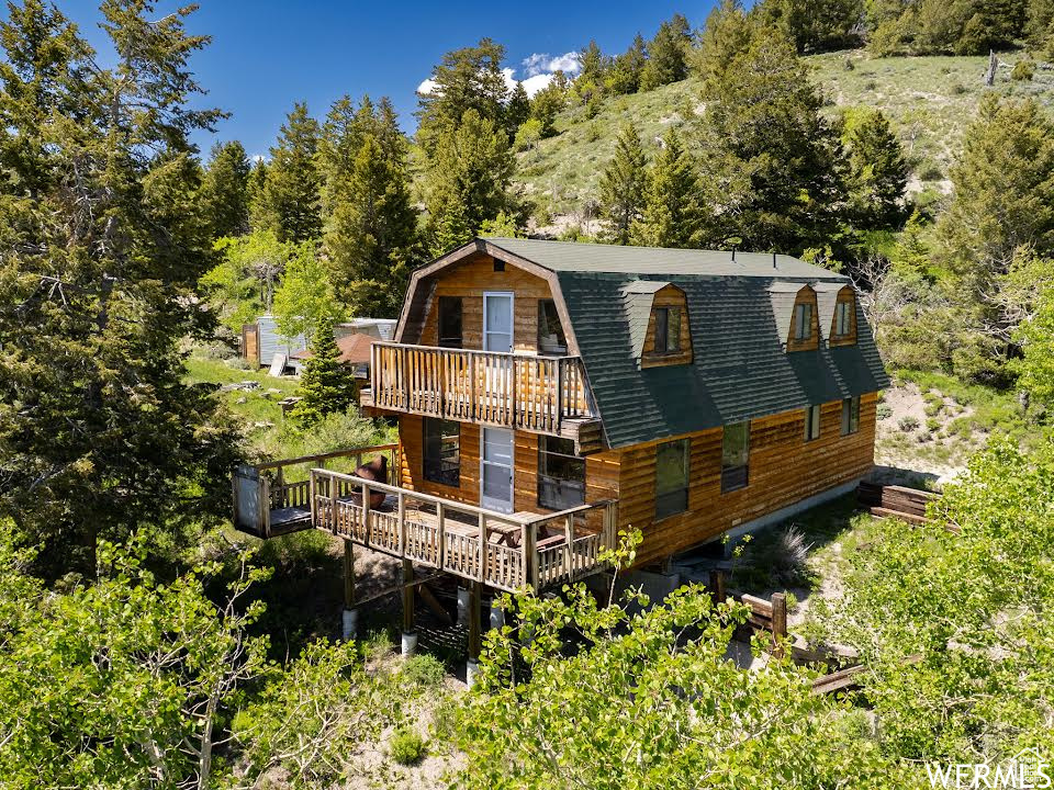 View of front of home with a deck