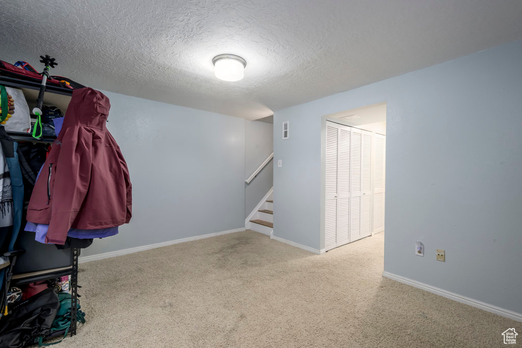 Interior space with light colored carpet