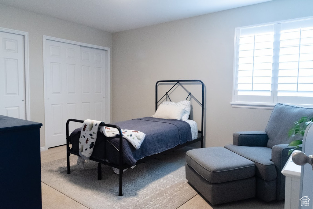 Bedroom with multiple closets