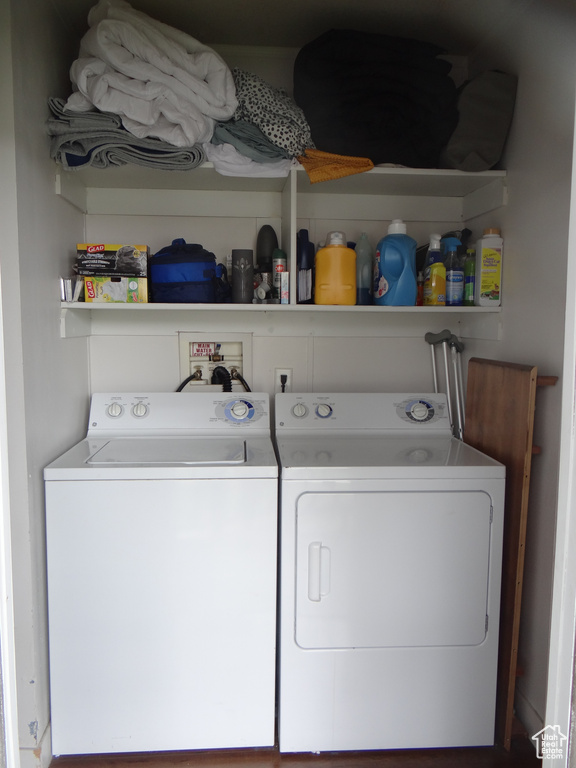 Clothes washing area with washer hookup and washing machine and dryer
