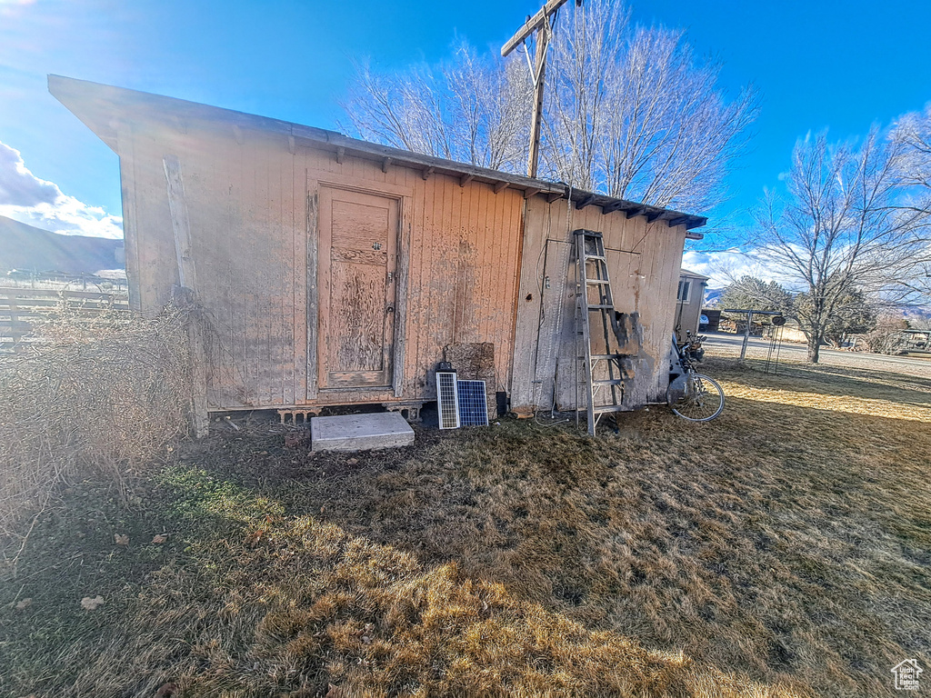 Back of property with central AC