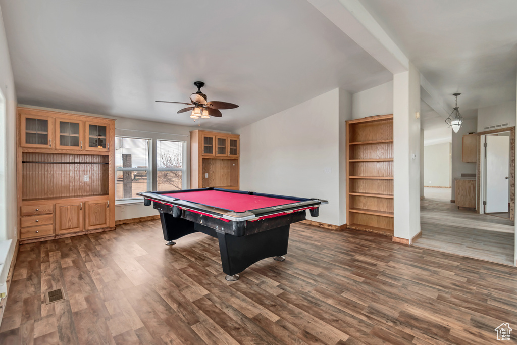 Rec room featuring dark hardwood / wood-style floors, ceiling fan, and pool table