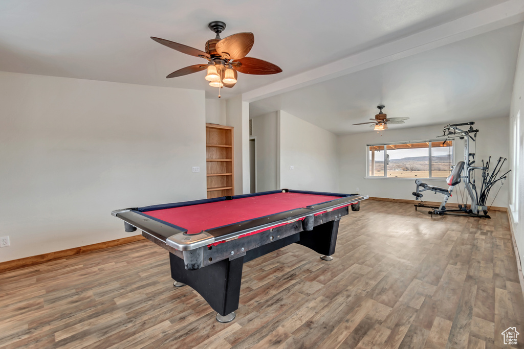 Playroom featuring light hardwood / wood-style floors, billiards, and ceiling fan