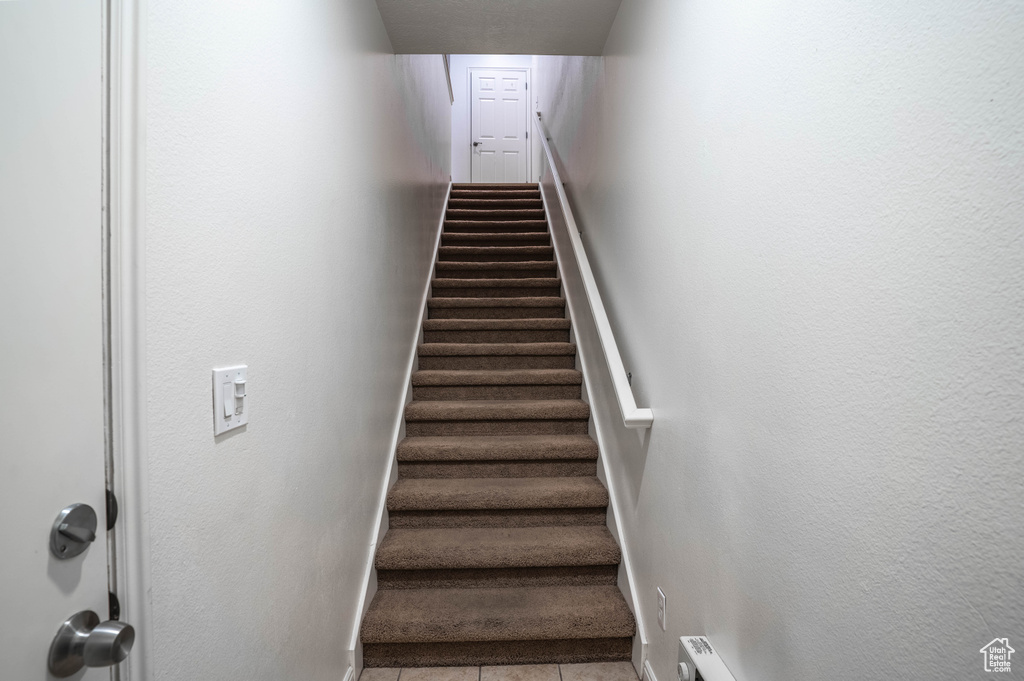Stairway with tile flooring