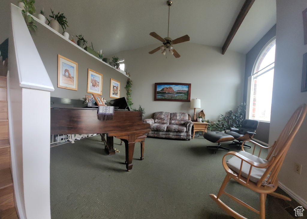 Office area with vaulted ceiling with beams, ceiling fan, and carpet floors