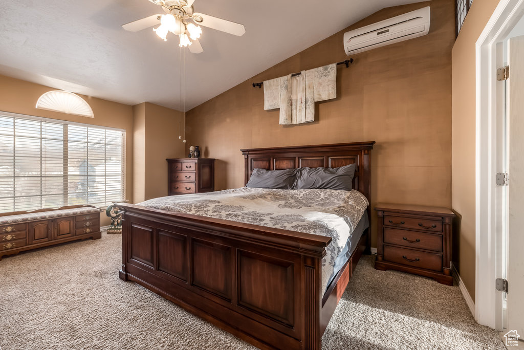 Bedroom featuring light carpet, a wall mounted AC, lofted ceiling, and ceiling fan