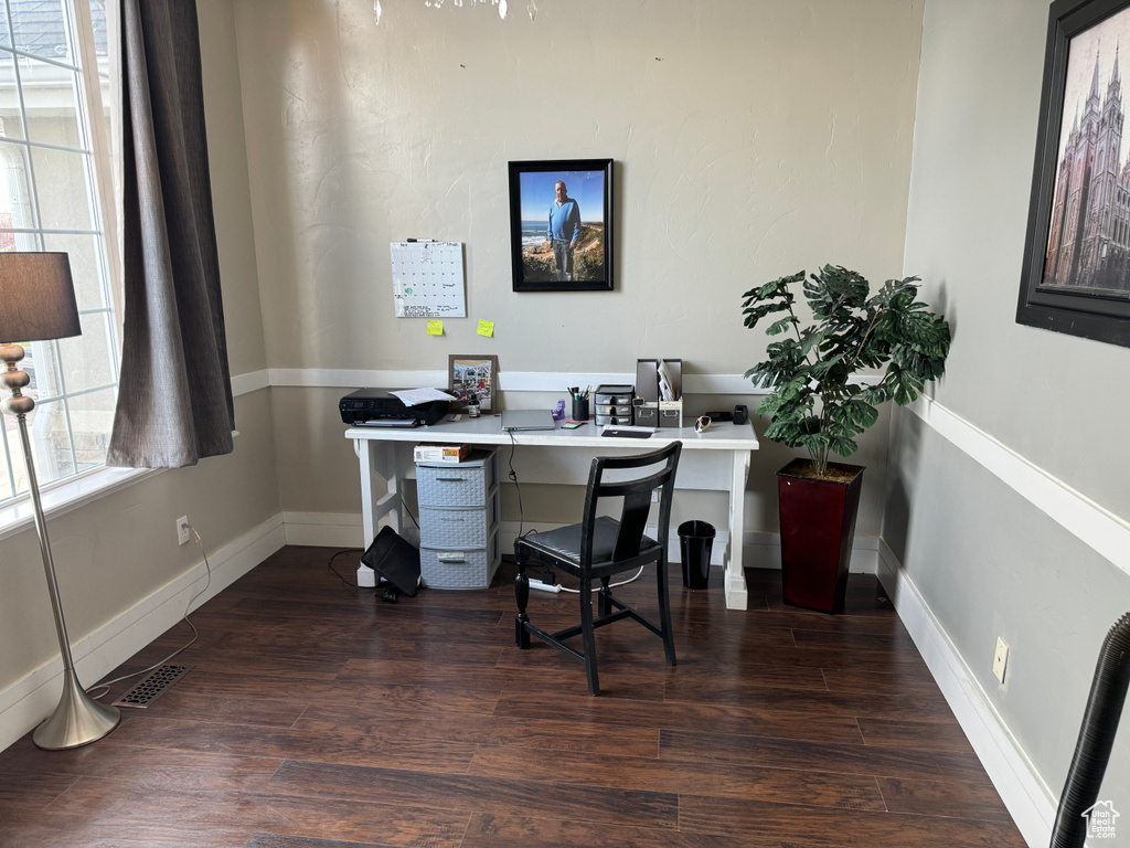 Office space featuring dark hardwood / wood-style floors