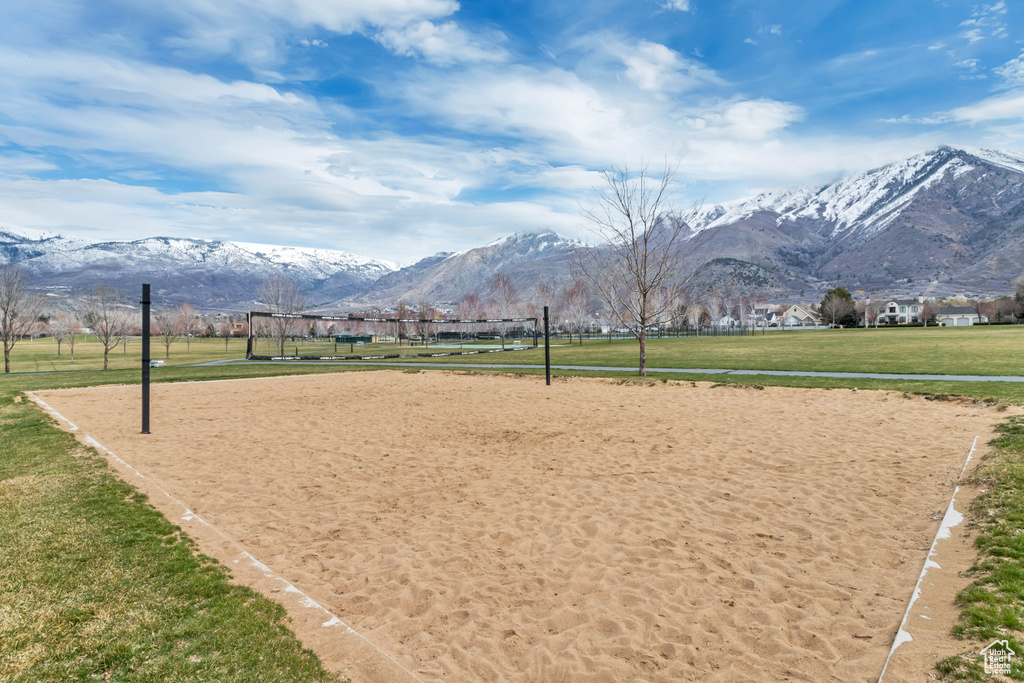 View of home\\\\\\\\\\\\\\\'s community with a lawn, volleyball court, and a mountain view