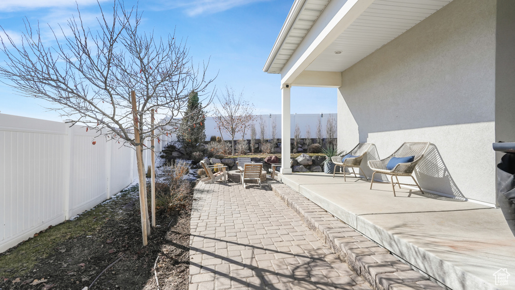 View of patio / terrace featuring a mountain view and an outdoor living space