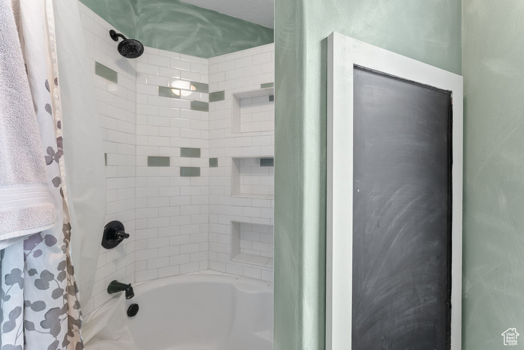 Bathroom featuring shower / bath combo