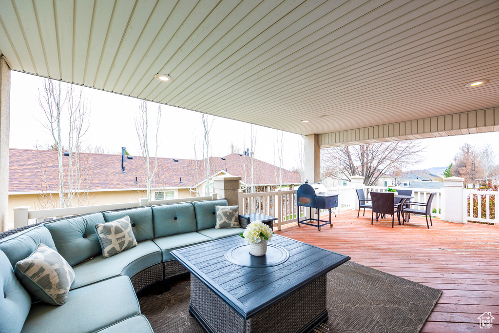 View of patio / terrace featuring an outdoor hangout area and a deck