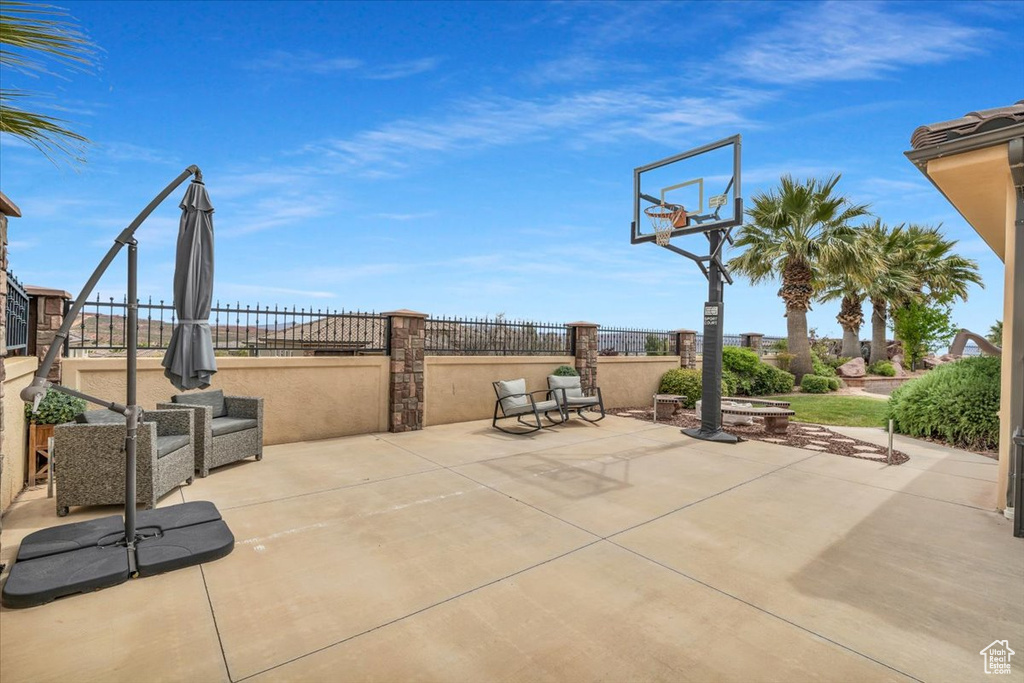 Exterior space with basketball hoop