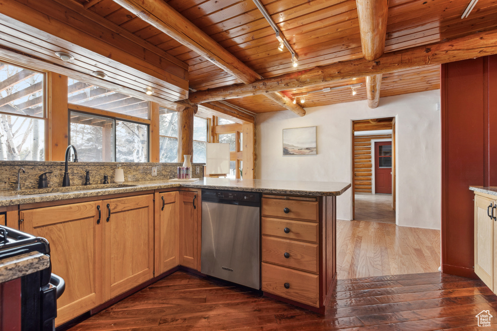 Kitchen with beamed ceiling, sink, dishwasher, wood ceiling, and dark hardwood / wood-style flooring