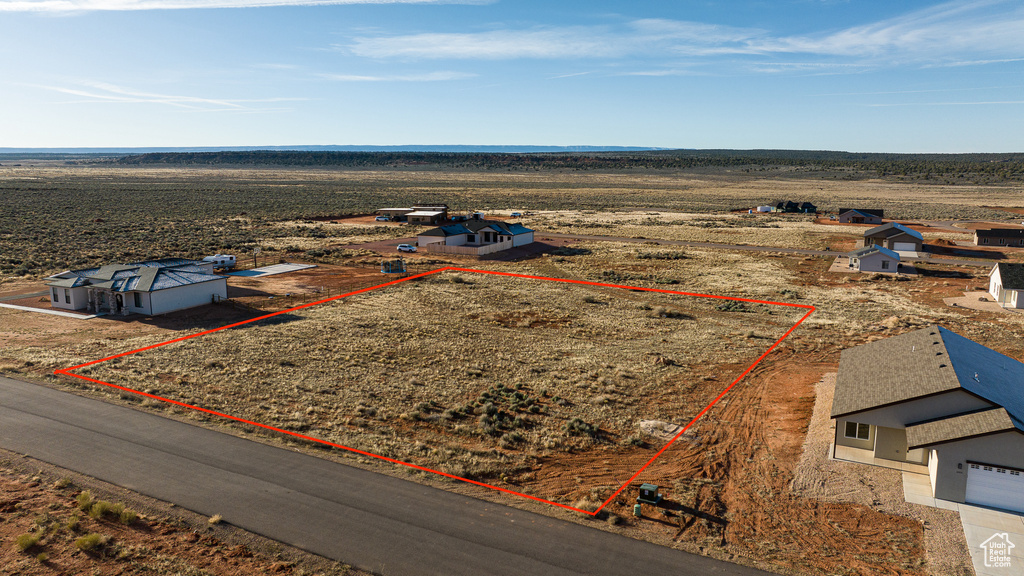 Birds eye view of property featuring a rural view