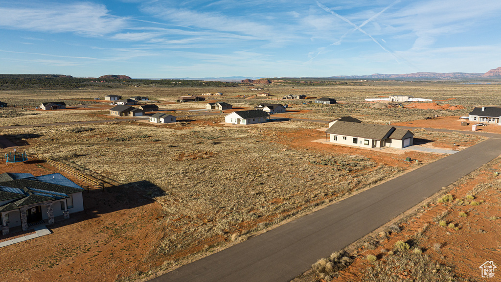 Birds eye view of property featuring a rural view