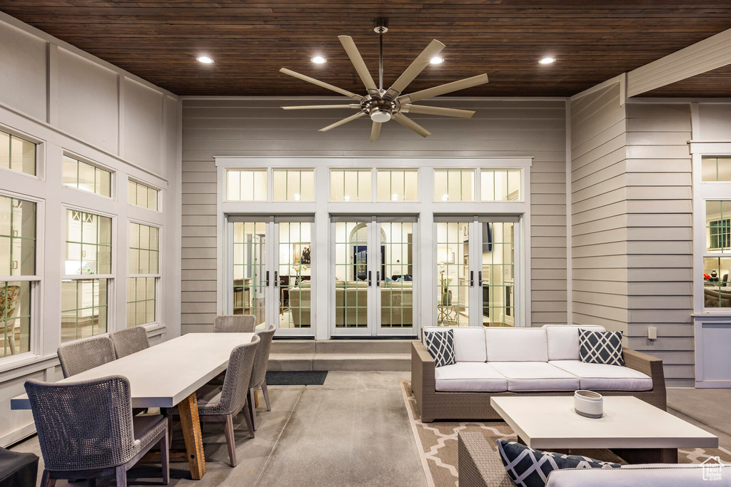 Interior space with french doors, wooden ceiling, and ceiling fan