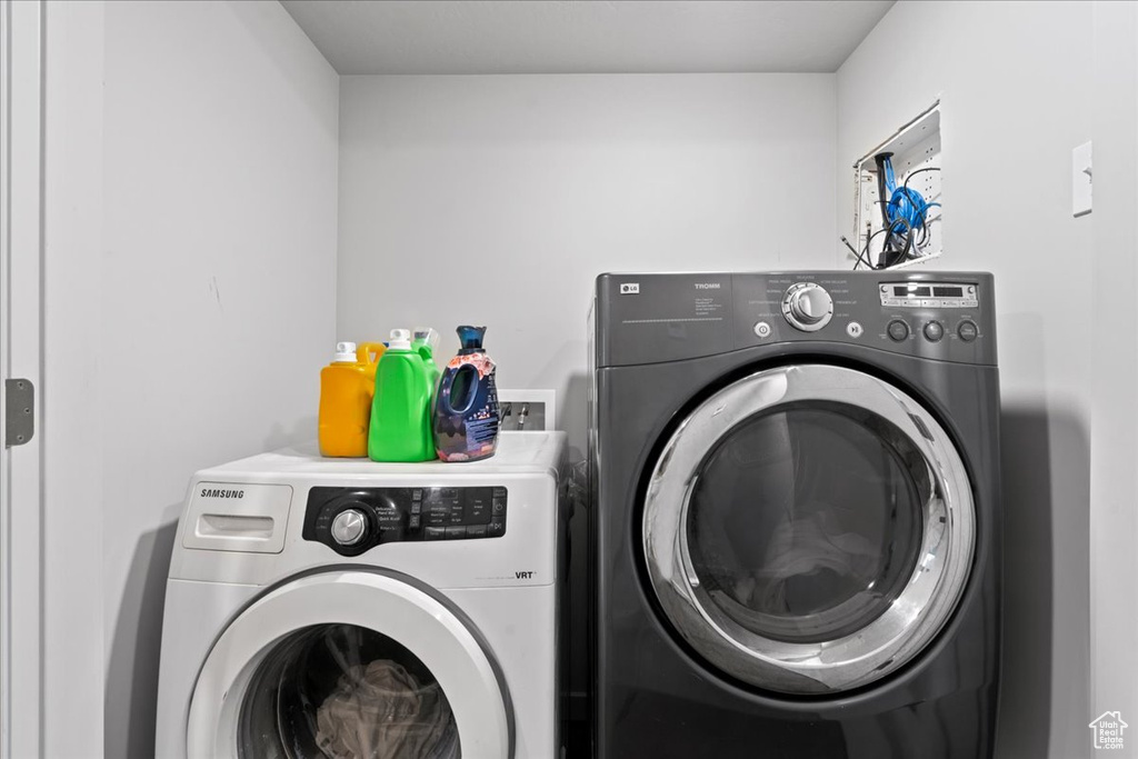 Laundry room with washer hookup and washer and dryer
