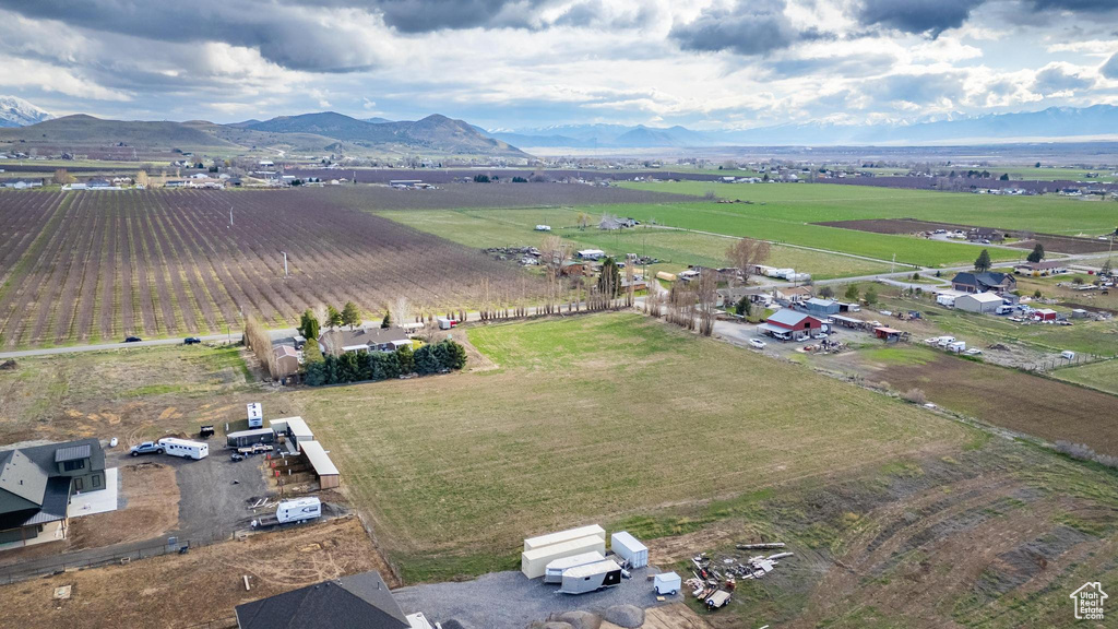 Birds eye view of property featuring a mountain view and a rural view