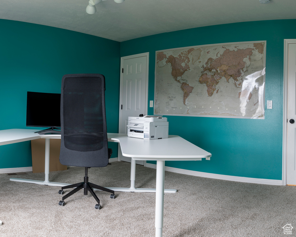 View of carpeted home office