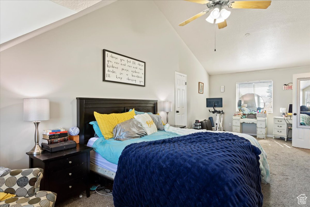 Bedroom featuring high vaulted ceiling, carpet, and ceiling fan