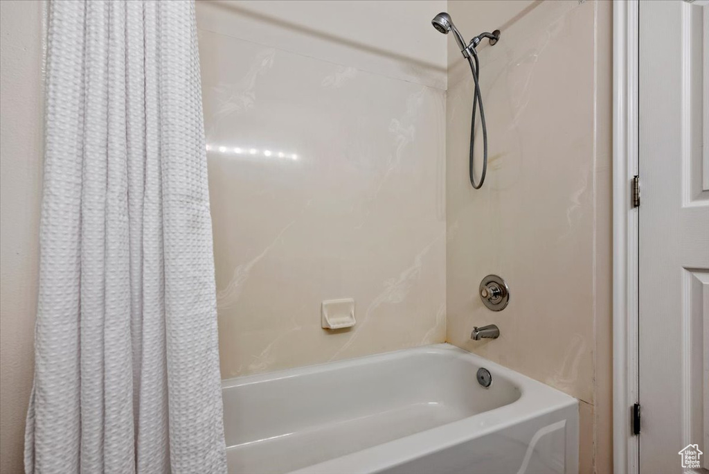 Bathroom featuring shower / bath combo