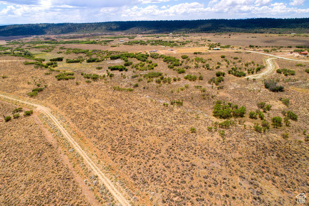 Birds eye view of property featuring a rural view