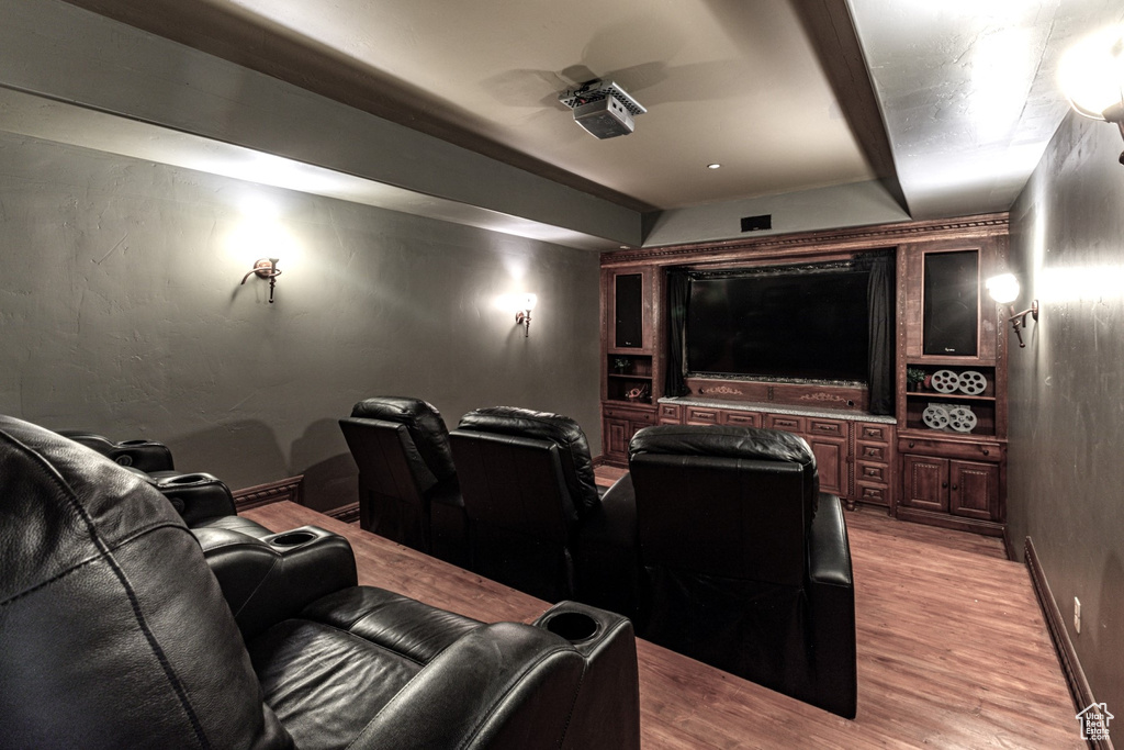 Home theater featuring light wood-type flooring