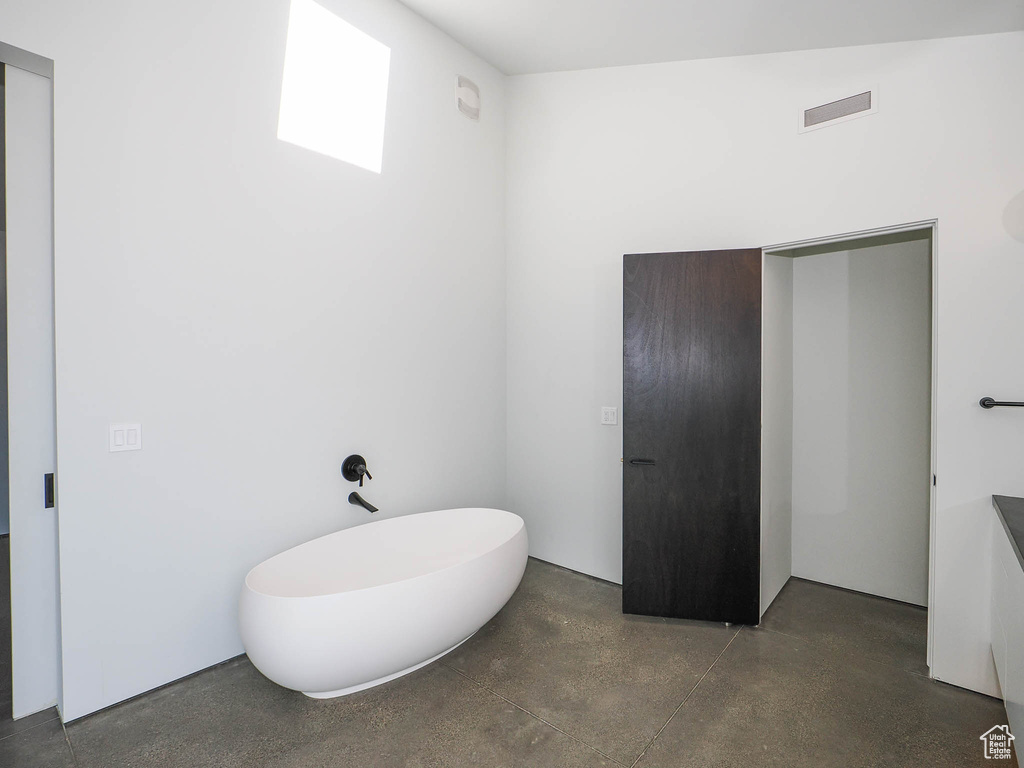 Bathroom with concrete floors