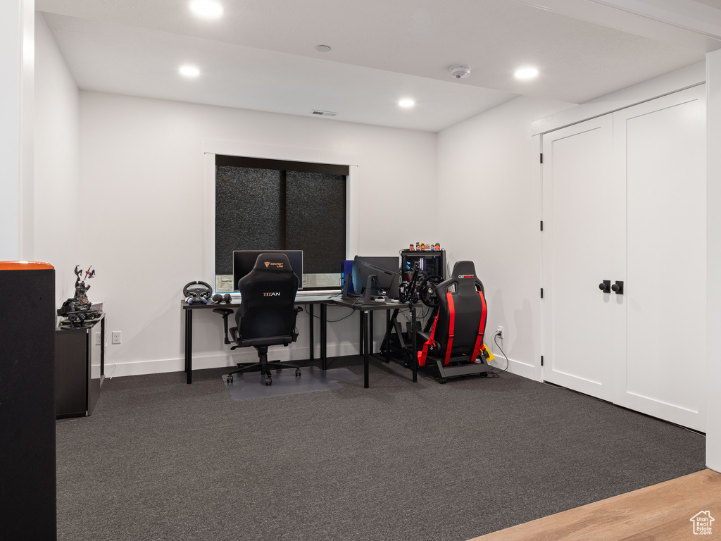 Office area featuring dark hardwood / wood-style flooring