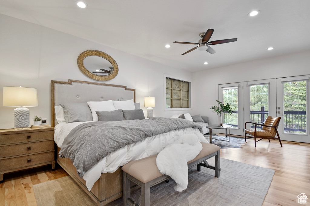 Bedroom with french doors, light hardwood / wood-style floors, access to exterior, and ceiling fan