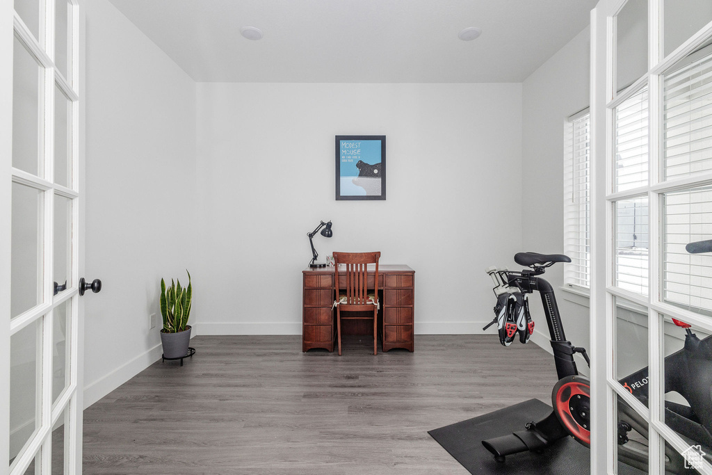 Workout area with wood-type flooring