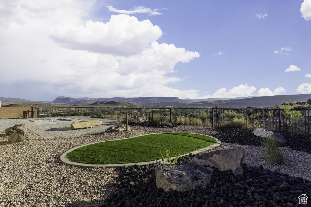 View of yard with a mountain view