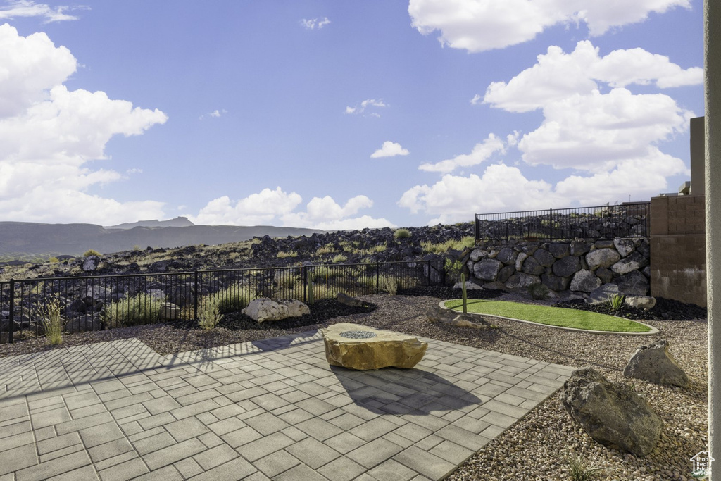 View of patio / terrace featuring a mountain view