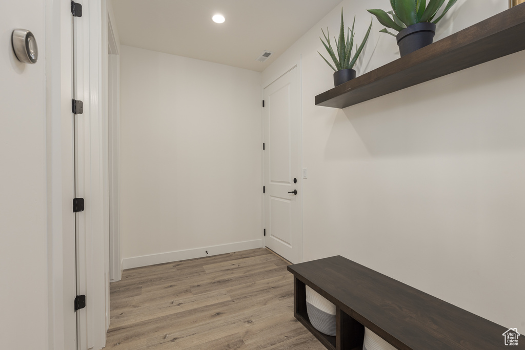 Mudroom featuring light hardwood / wood-style floors